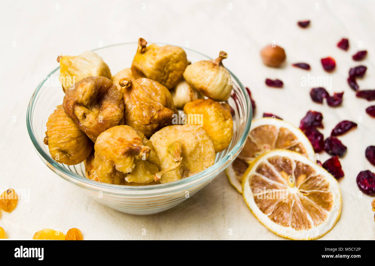Dry figs in a glass bowl. Healthy snack Stock Photo Alamy