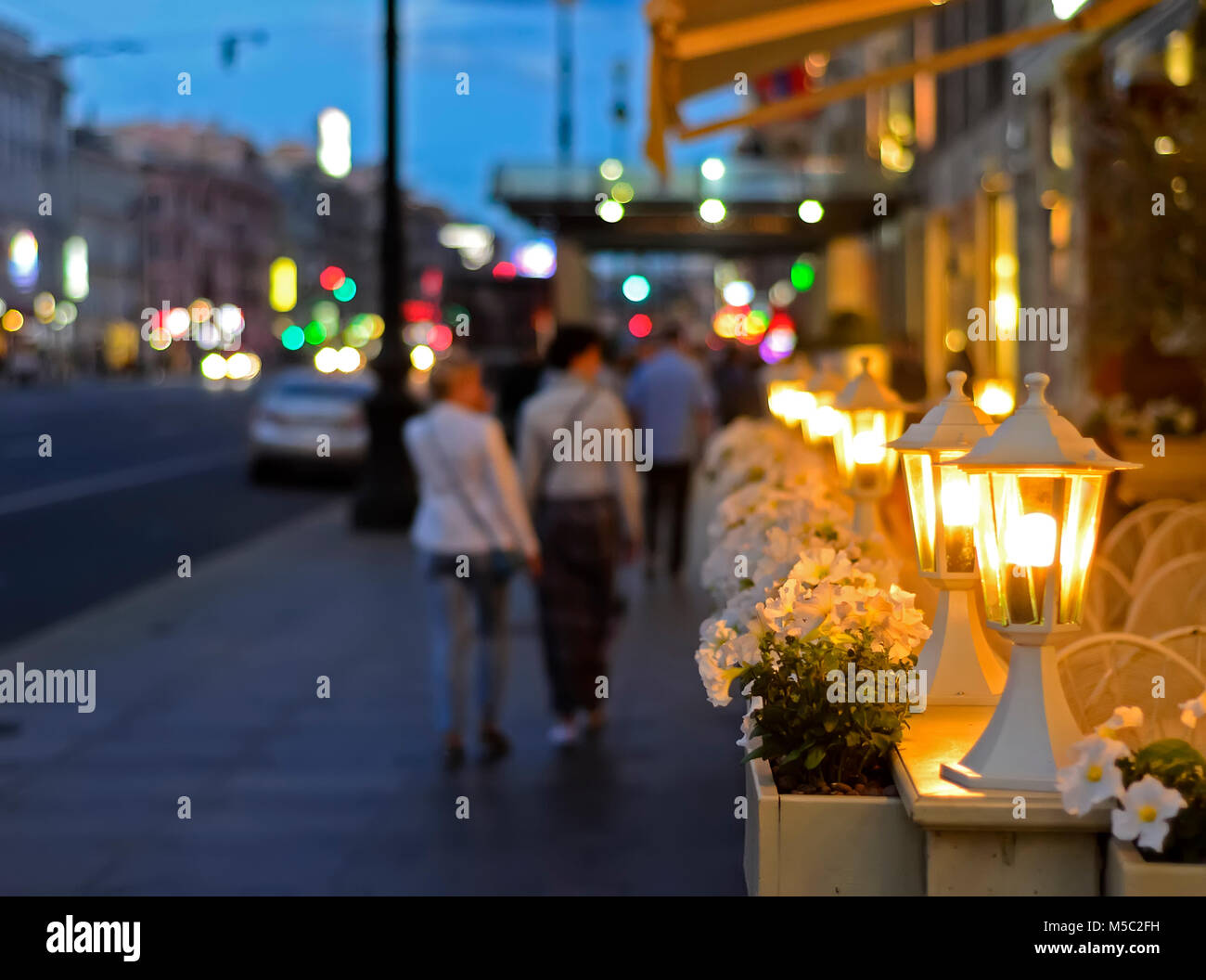 The lights of the night city in summer.Night city life. Stock Photo