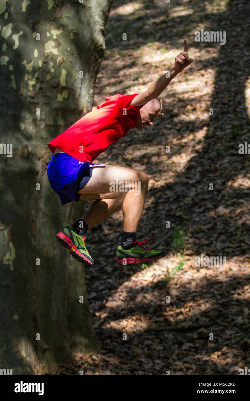 Boy training in the forest in a trailrunning session Stock Photo Alamy