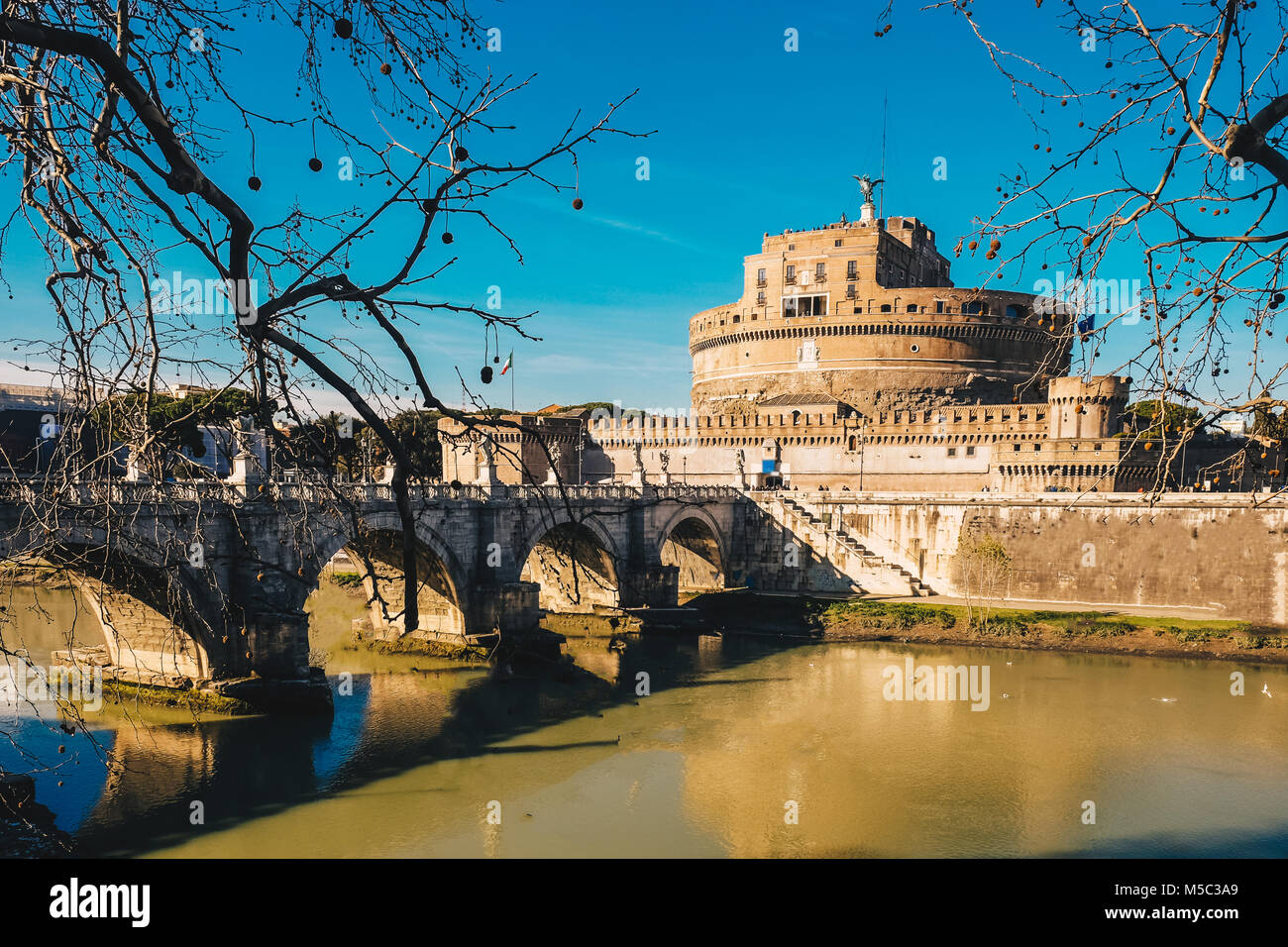 Sant' Angelo Castle and Sant' Angelo bridge in Rome, Italy, Stock Photo