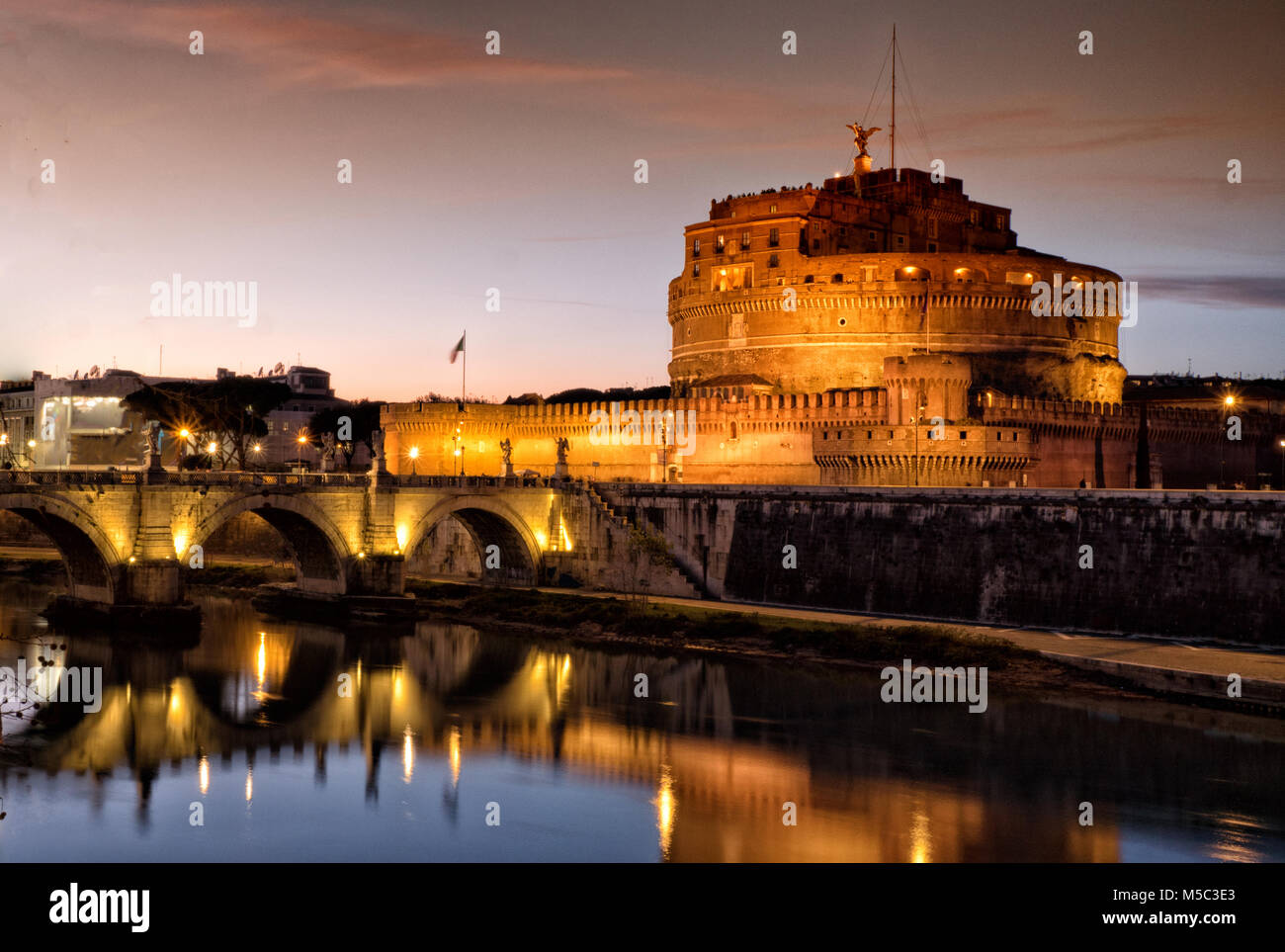 Sant' Angelo Castle and Tiber River in Rome, Italy by night Stock Photo
