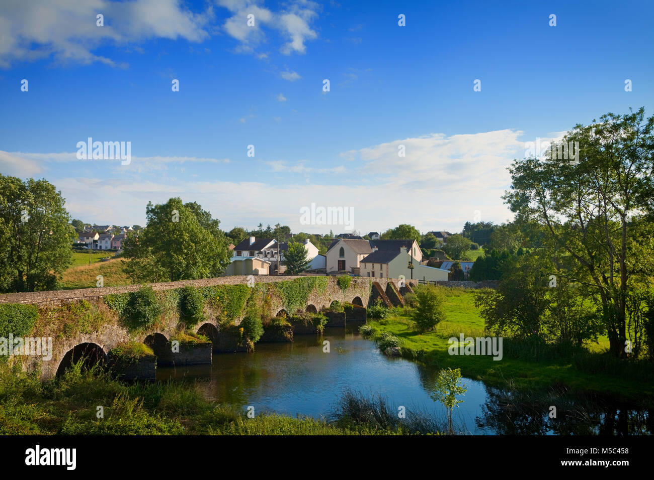 Old 18th Century Bridge over the King's River and Kells Village, County Kilkenny, Ireland Stock Photo