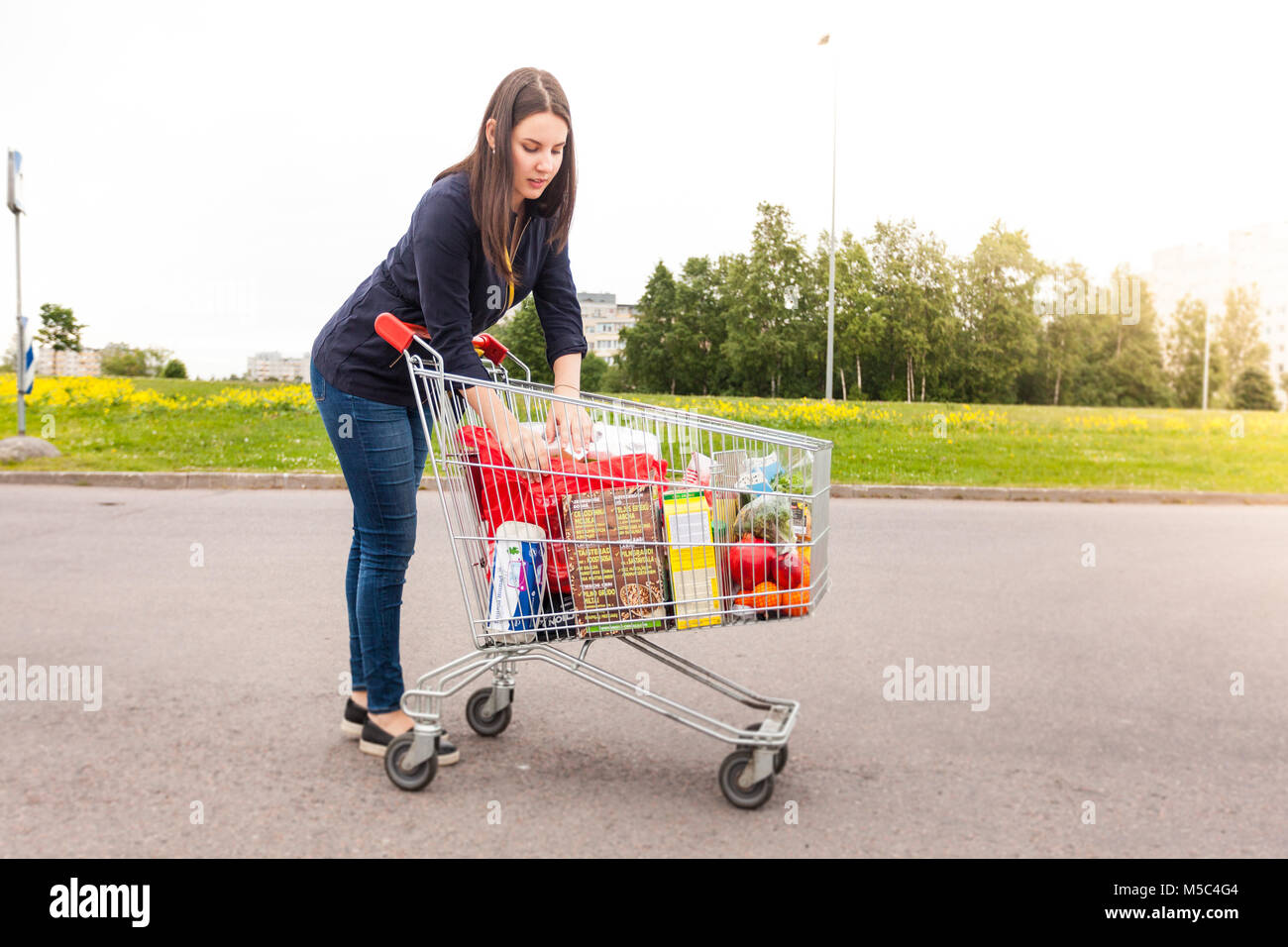 Modern teenager goes product shopping on a salary day Stock Photo