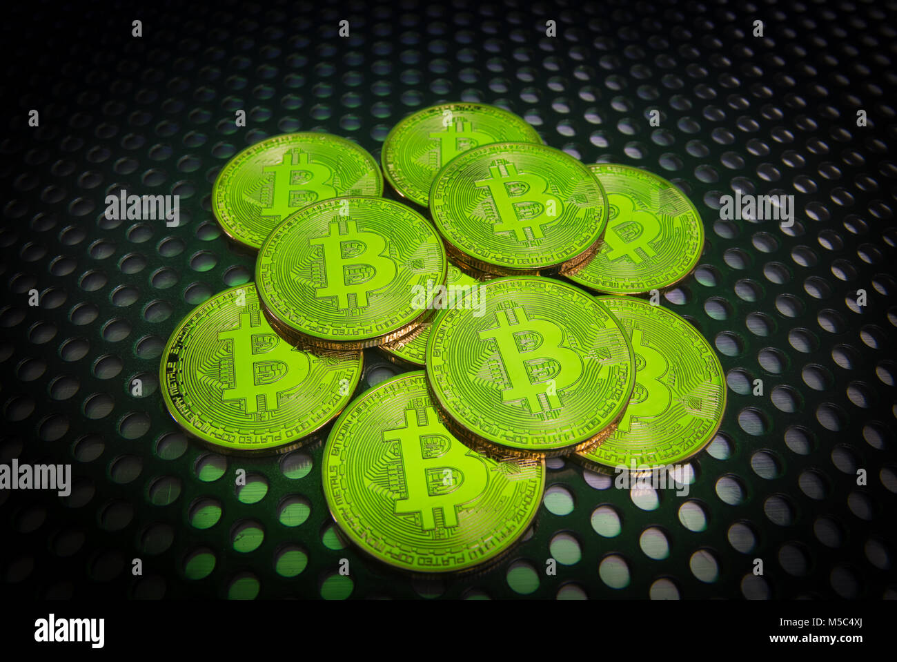 Pile of bitcoins on metal background.Credit:Mario Beauregard/Alamy Live News Stock Photo