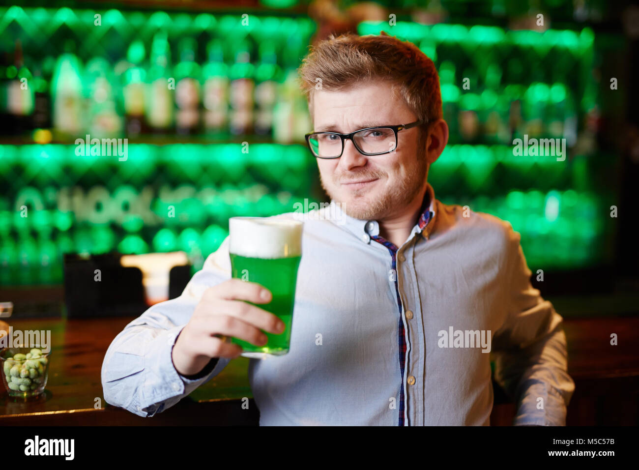 Guy by bar counter Stock Photo