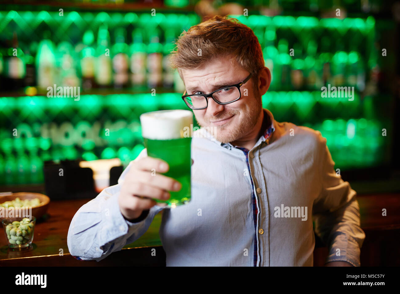 Guy toasting Stock Photo