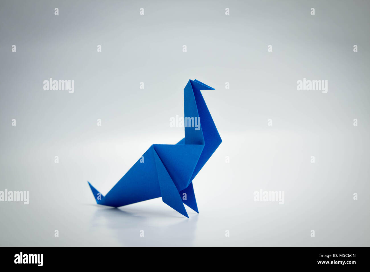 Blue seal Origami isolated on white Stock Photo