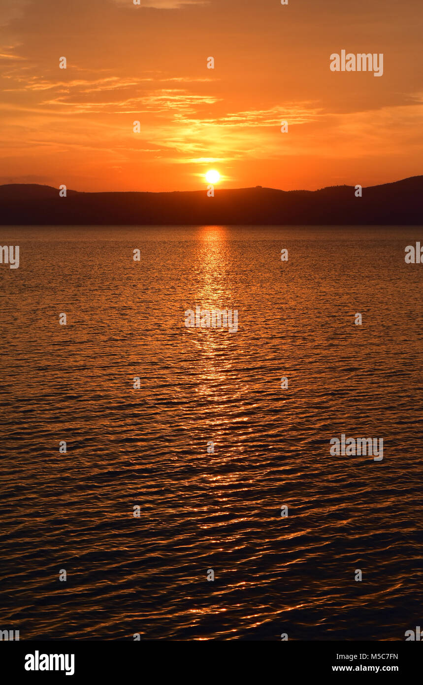 The Bracciano lake sunset, from the ancient town of Anguillara Sabazia (Rome, Italy) Stock Photo