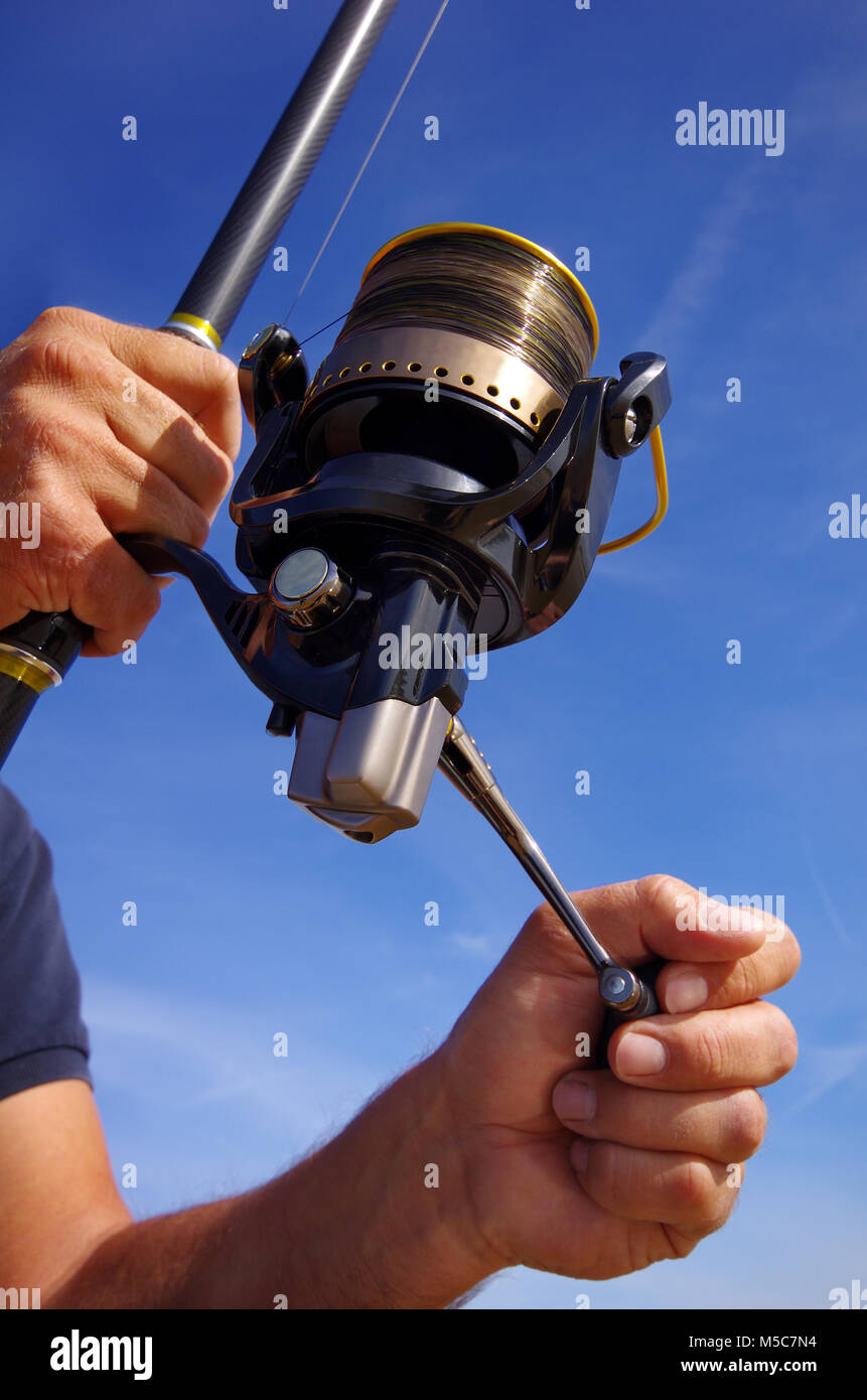 Close-up on fishing reel Stock Photo