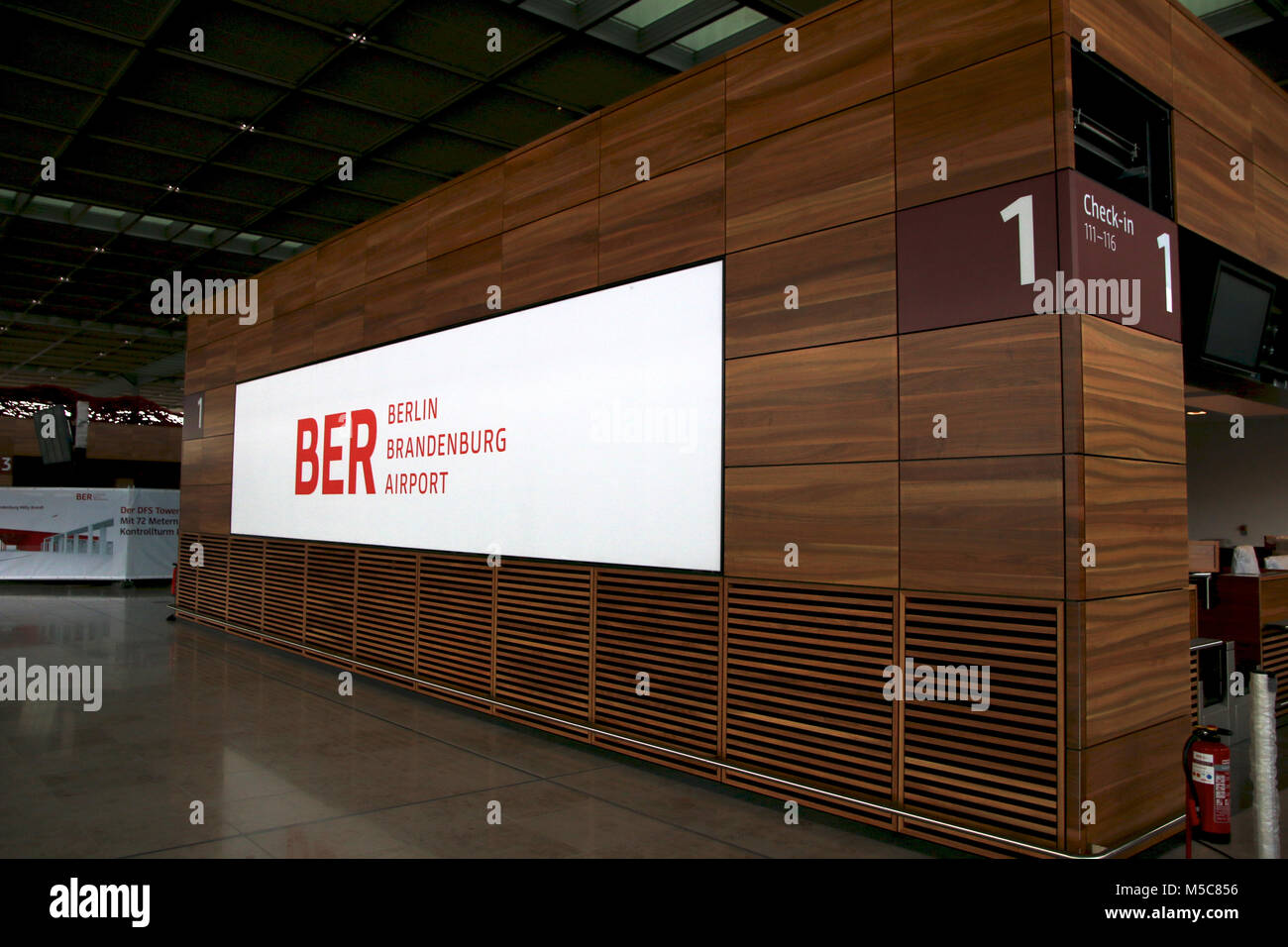 BERLIN, GERMANY - JAN 17th, 2015: Inside of the Berlin Brandenburg Airport BER, still under construction, empty terminal building, architecture tour Stock Photo