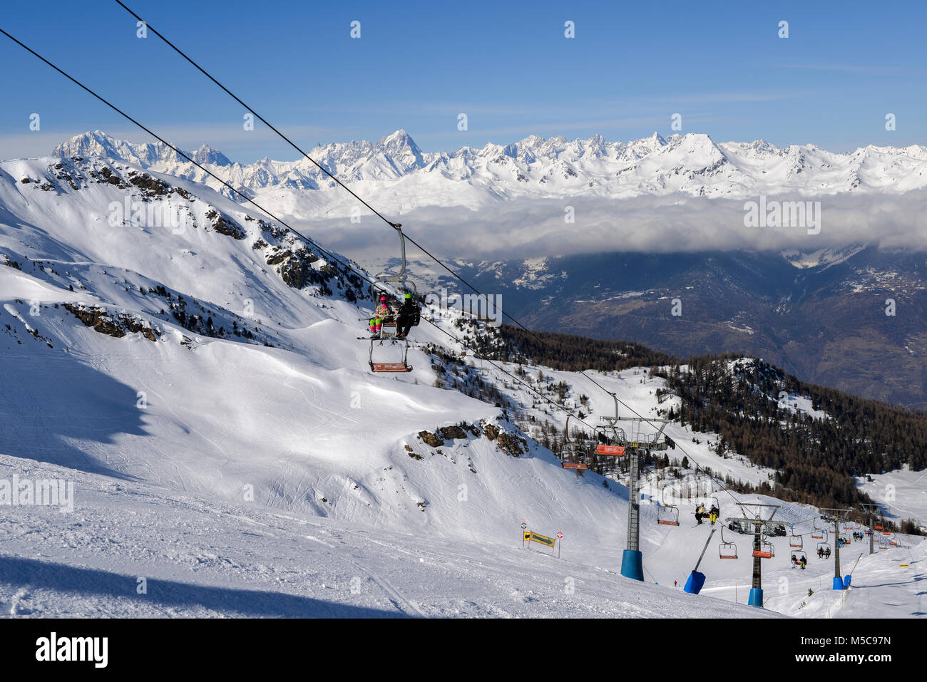 Pila, Aosta, Italy - Feb 19, 2018: Chairlift at Italian ski area ...