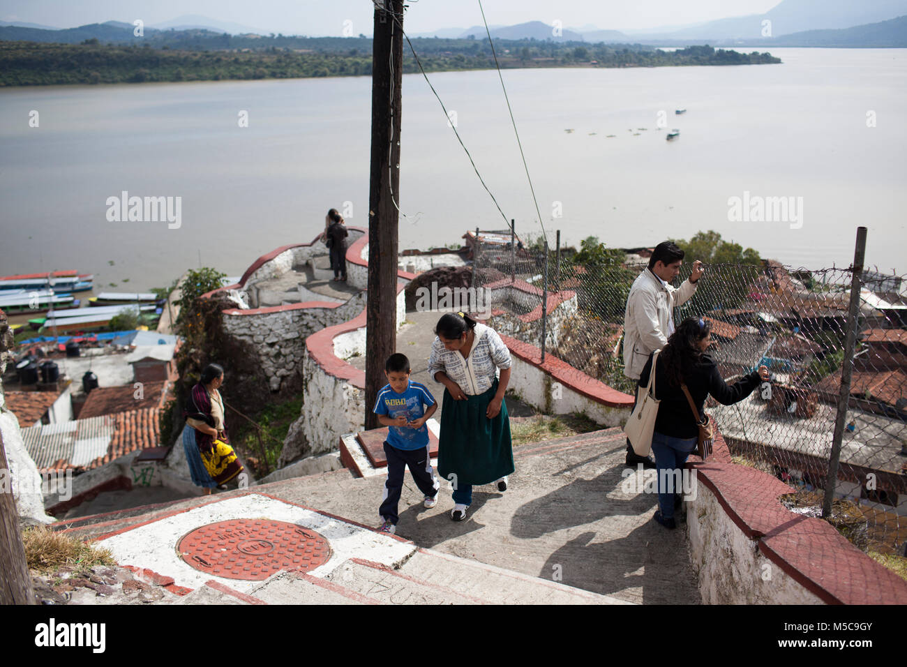People climb Janitzio Island during Dia de los Muertos (Day of the Dead ...