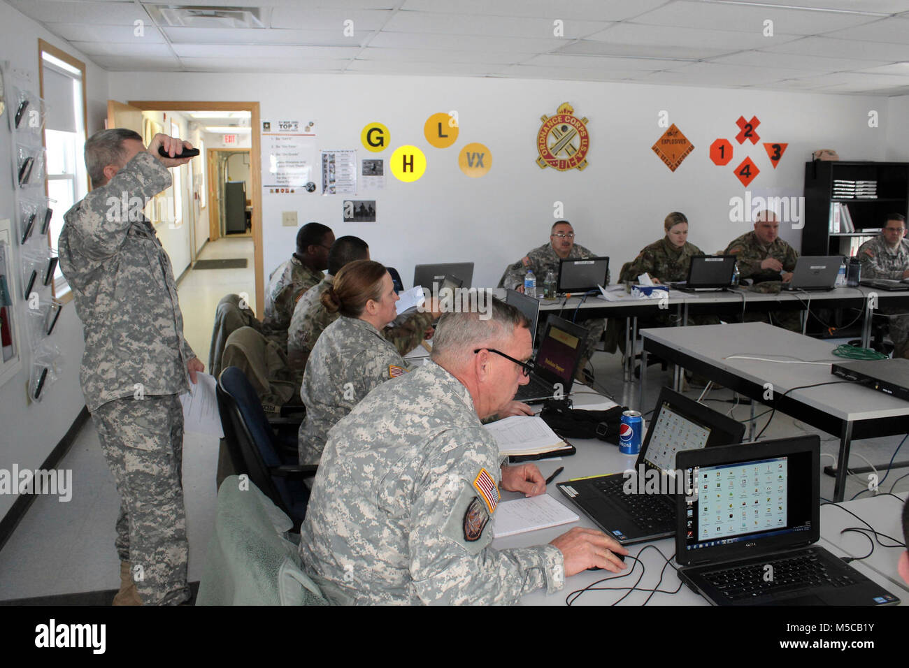 Students and instructors complete a project in the 89B Advanced Leader Course, a course taught by the 13th Battalion, 100th Regiment, on Jan. 16, 2018, at Fort McCoy, Wis. The 13th, 100th is an ordnance battalion that provides training and training support to Soldiers in the ordnance maintenance military occupational specialty series. The unit, aligned under the 3rd Brigade, 94th Division of the 80th Training Command, has been at Fort McCoy since about 1995. (U.S. Army Stock Photo