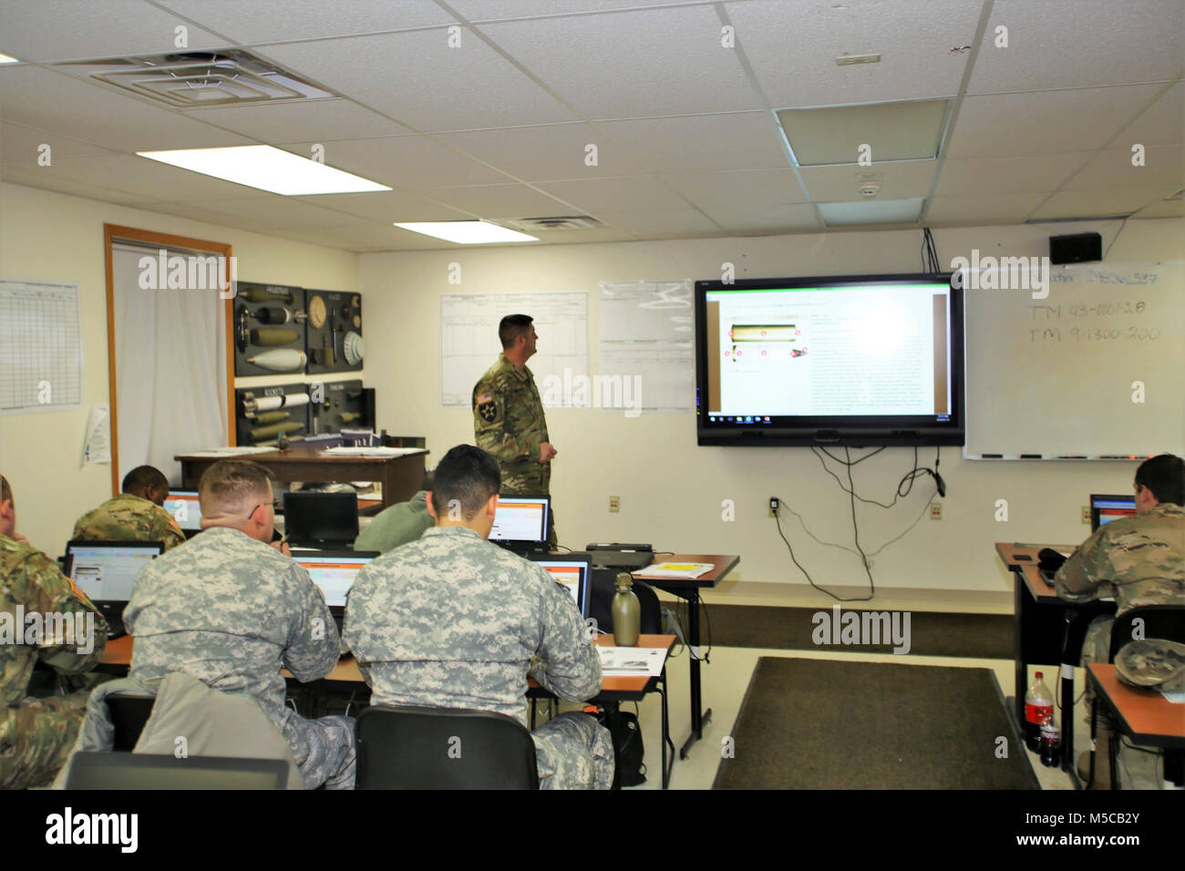 Instructor Sgt. 1st Class Jeremy VanStreain with the 13th Battalion, 100th Regiment teaches students in the 89B Ammunition Supply Course on Jan. 16, 2018, at Fort McCoy, Wis. The 13th, 100th is an ordnance battalion that provides training and training support to Soldiers in the ordnance maintenance military occupational specialty (MOS) series. The unit, aligned under the 3rd Brigade, 94th Division of the 80th Training Command, has been at Fort McCoy since about 1995. (U.S. Army Stock Photo