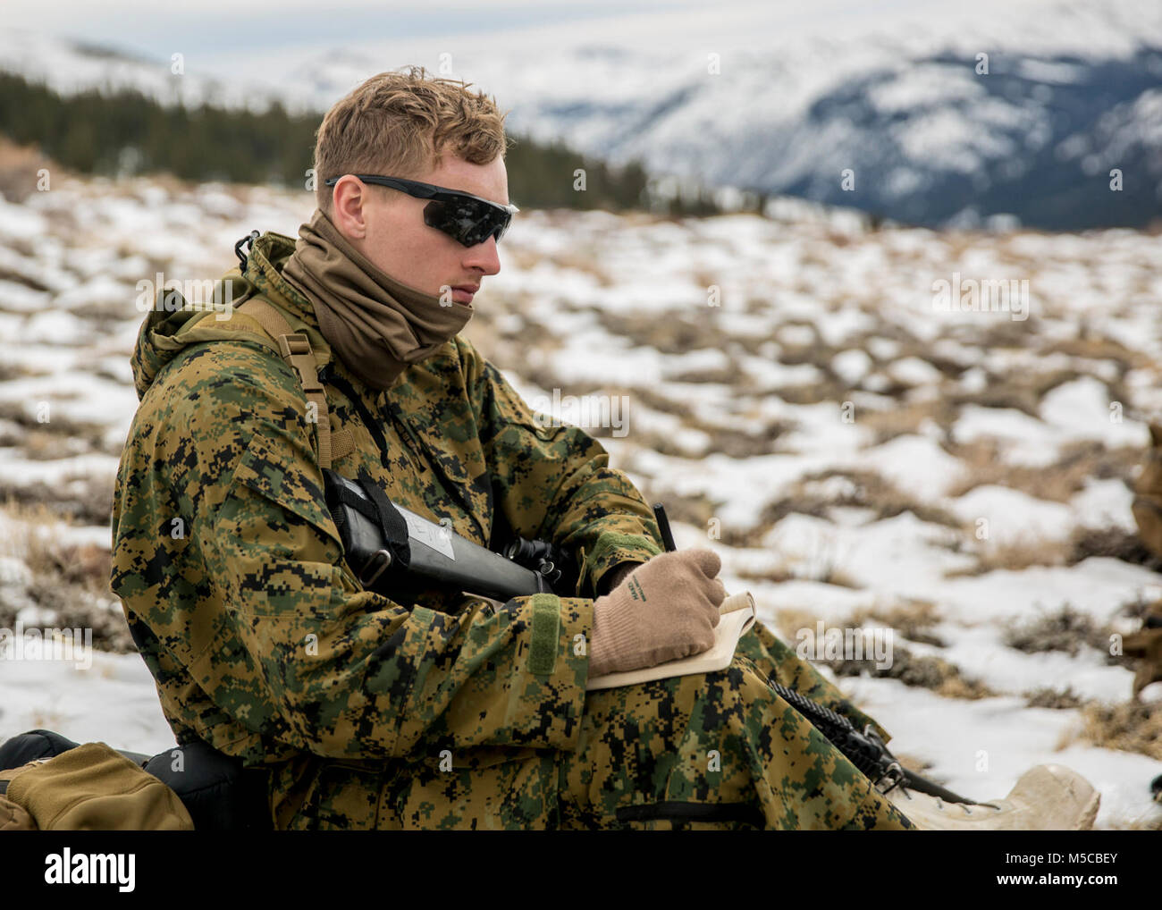 U.S. Marine Corps Pvt. Matthew M. Stephens, a low altitude air defense (LAAD) gunner with Alpha Battery, 2nd LAAD Battalion, takes notes during Mountain Training Exercise (MTX) 1-18 on Marine Corps Mountain Warfare Training Center Bridgeport, Calif. on Jan. 28, 2018. 2nd LAAD participated in MTX to increase the unit’s ability to rapidly respond, sustain itself, and to accomplish missions in a unique cold weather environment and mountainous terrain. (U.S. Marine Corps Stock Photo