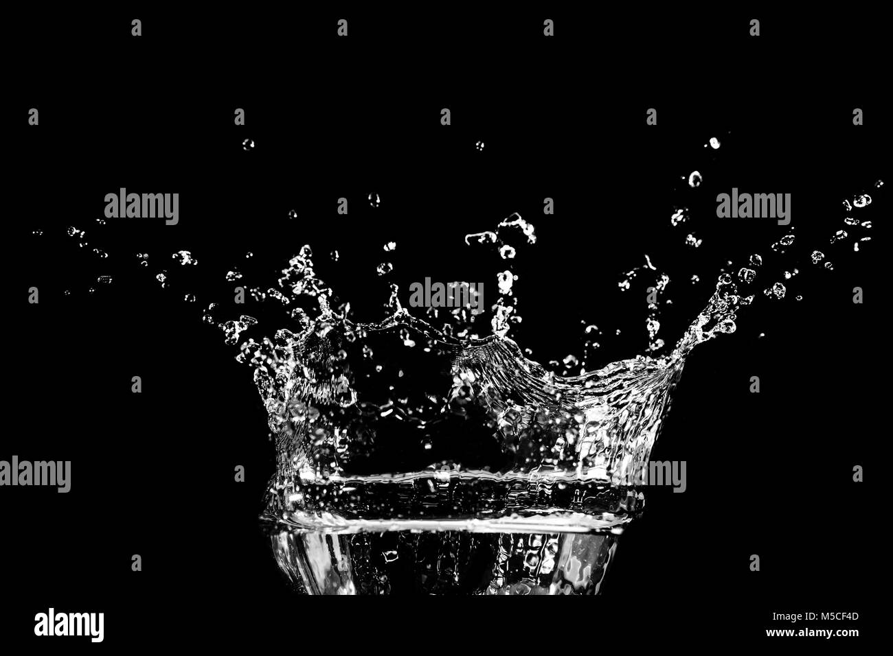 water splash isolated on the black background Stock Photo - Alamy