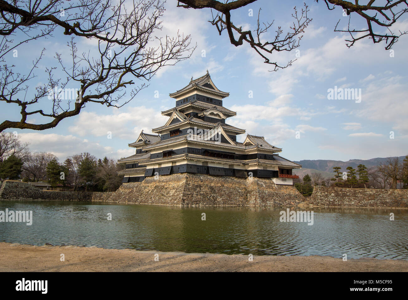 Matsumoto Castle is one of Japan's premier historic castles, The building is also known as the 'Crow Castle' due to it's black exterior. Stock Photo
