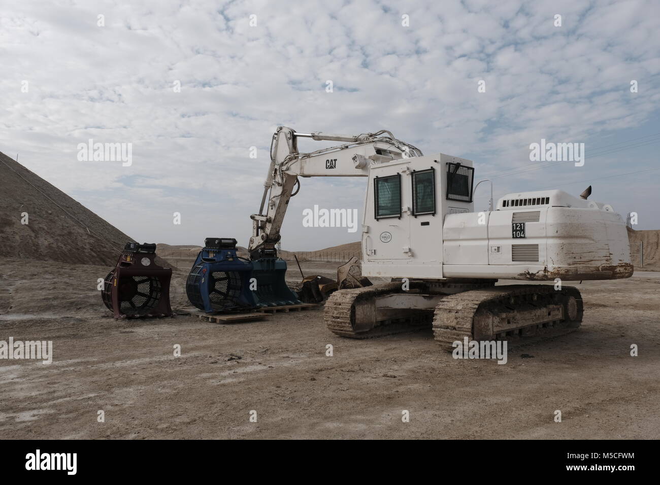 A mine clearance machine with a heavy roller attachment that can clear