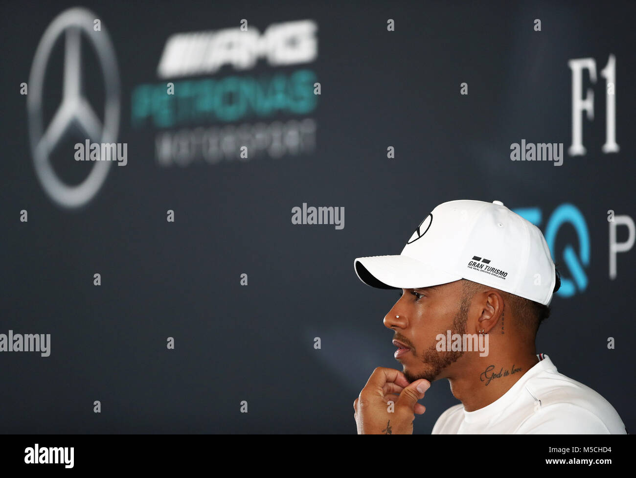 Mercedes driver Lewis Hamilton attends a press conference during the Mercedes-AMG F1 2018 car launch at Silverstone, Towcester. Stock Photo