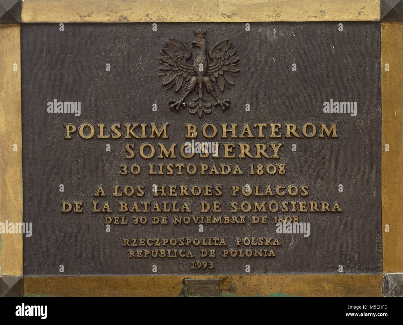 Commemorative plaque dedicated to the Polish dead in the Battle of Somosierra (30th November, 1808), during the Spanish War of Independence, because of the heroic fight carried out by the Polish cavalry, commanded by Jan Kozietulski. Located in the facada of the Ermita de Nuestra Señora de la Soledad. 1993. Somosierra, Autonomous Community of Madrid, Spain. Stock Photo