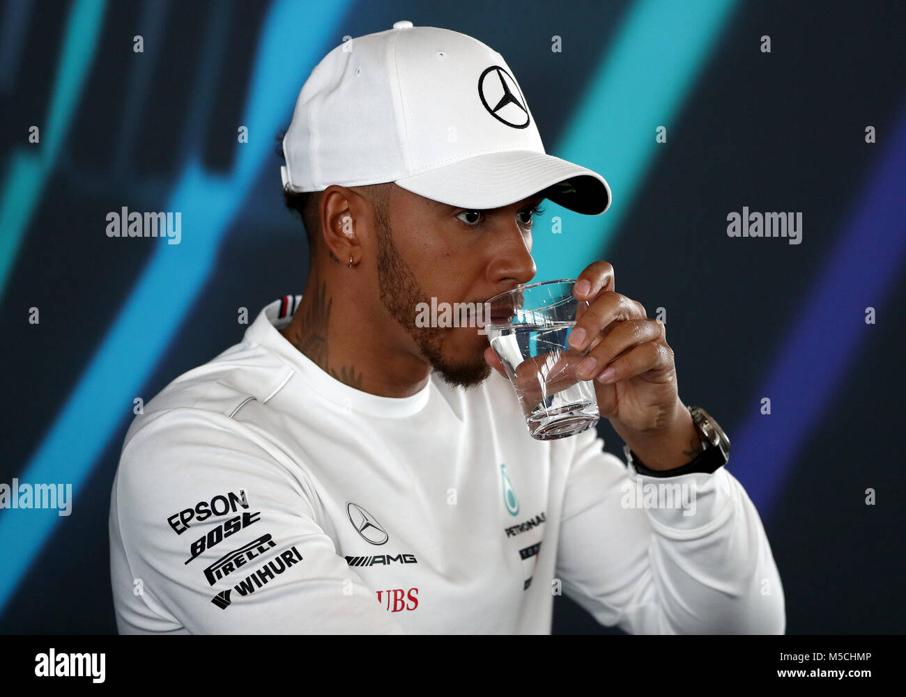 Mercedes driver Lewis Hamilton attending a press conference during the Mercedes-AMG F1 2018 car launch at Silverstone, Towcester. Stock Photo