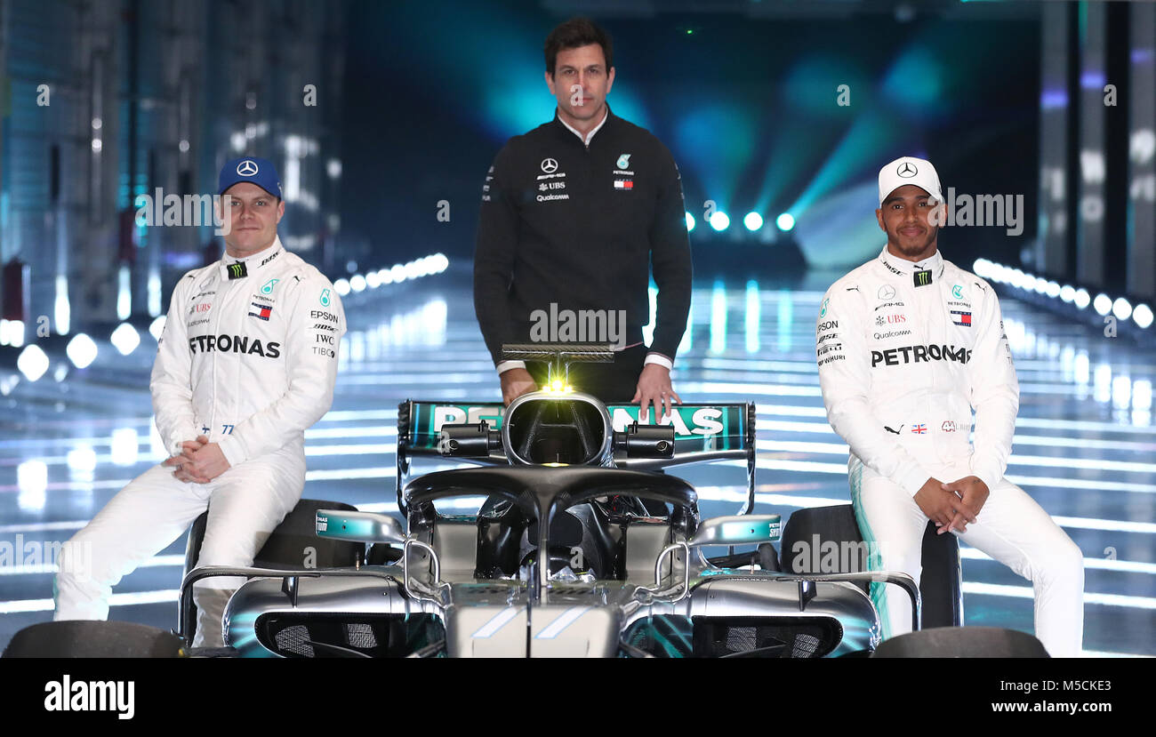Mercedes Lewis Hamilton (right) and Valtteri Bottas (left) alongside team principal Toto Wolff as they pose for a picture with the new Mercedes W09 EQ Power+ during the Mercedes-AMG F1 2018 car launch at Silverstone, Towcester. Lewis Hamilton and team principal Toto Wolff (right) next to the new Mercedes W09 EQ Power+ during the Mercedes-AMG F1 2018 car launch at Silverstone, Towcester. Stock Photo