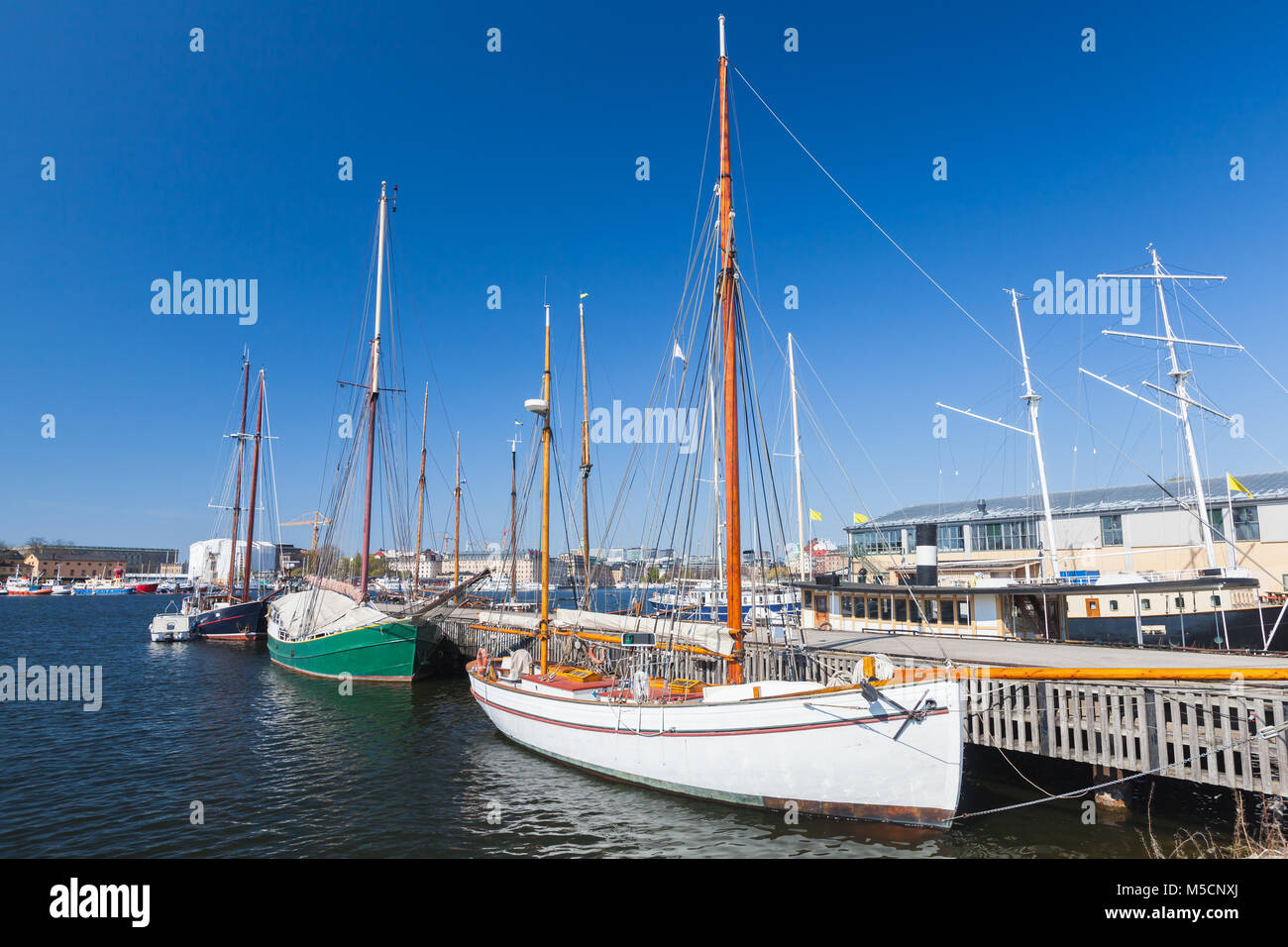 Vintage sailing yachts moored in Stockholm city, Sweden Stock Photo