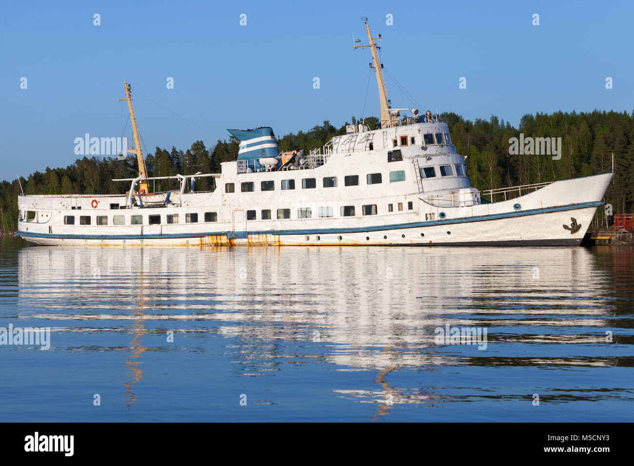 Moored old white passenger ship on the coast of Saimaa lake, Finland Stock Photo