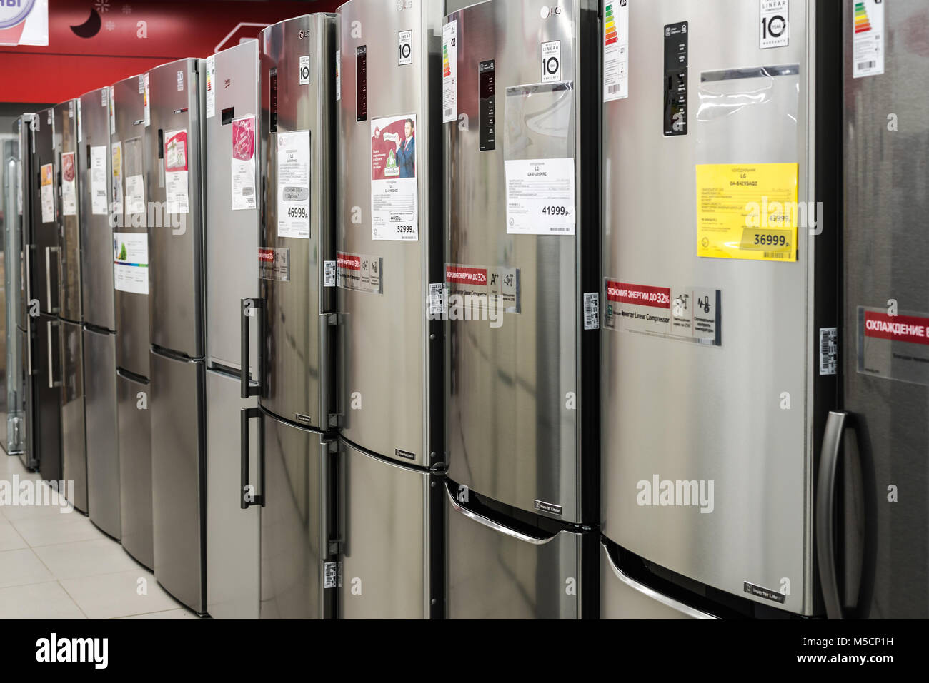 Moscow, Russia - February 20, 2018. Gray refrigerators in electronics store Eldorado Stock Photo