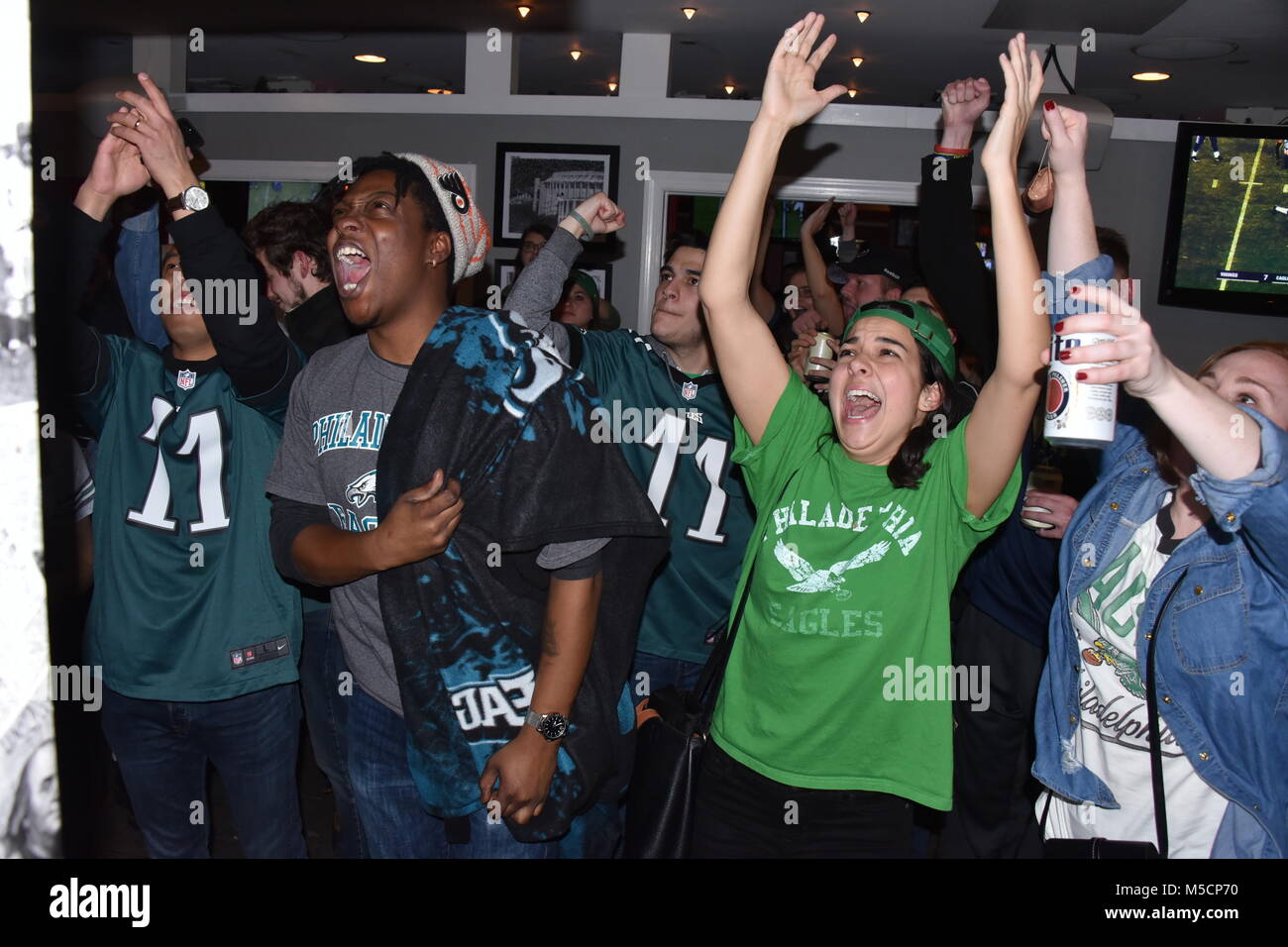 Crowds of Philadelphia Eagles fans celebrate at Broad and Walnut Streets as the Eagles won the NFC Championship game over the Minnesota Vikings on Sunday, January 21, 2018 at Lincoln Financial Field in Philadelphia, Pa.  Featuring: Atmosphere Where: Philadelphia, Pennsylvania, United States When: 21 Jan 2018 Credit: Hugh Dillon/WENN.com Stock Photo