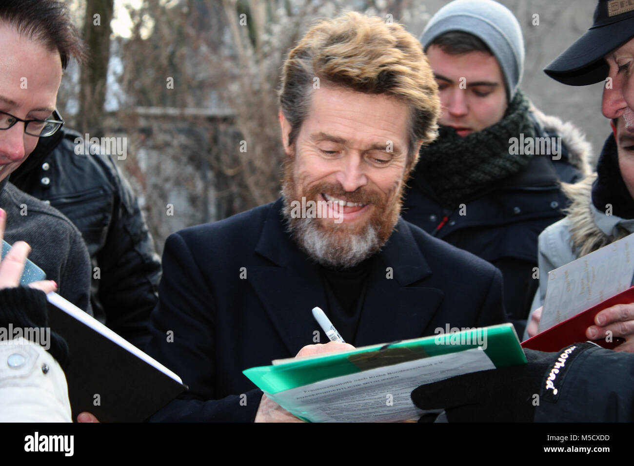 Willem Defoe gives autographs to his fans. 68th BERLINALE, Where: Berlin/Germany, When:, Featuring: Willem Dafoe, When: 21th February 2018 Stock Photo