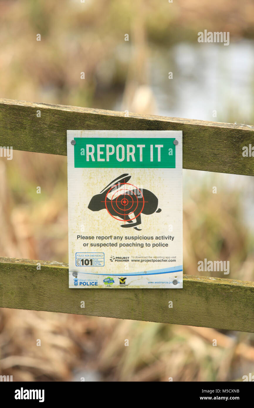 West Mercia police sign asking members of the public to report any poaching, or suspicious activity. Stock Photo