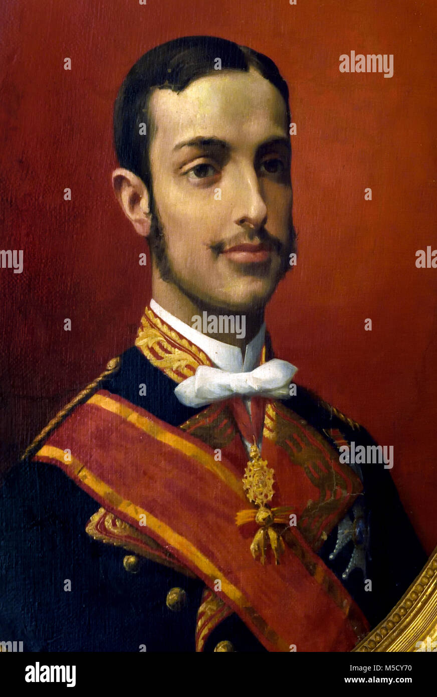 King Alfonso XII of Spain by Pedro Rodrigues de la Torre 1847-1915 19/20th, century, Spain, Spanish, ( portrait of King Alfonso XII of Spain (1857-1885), dressed in a gala captain's uniform ) Stock Photo