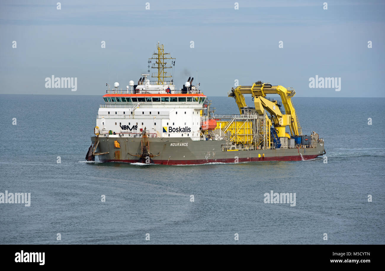 The Boskalis 'Ndurance' dredger and calbe laying vessel on its return to the  Grampian harbour of Aberdeen on the North East Scottish coast. Stock Photo