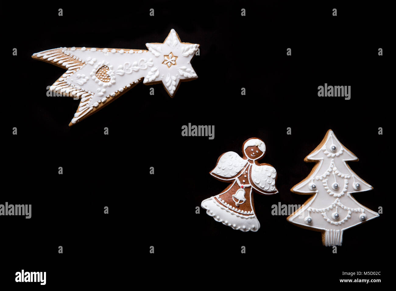 Christmas gingerbreads isolated on black background Stock Photo