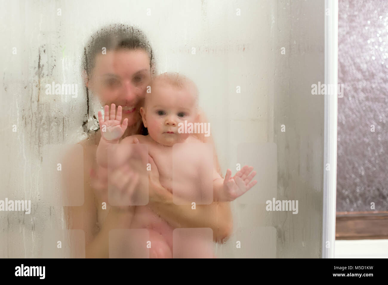 Mother And Baby Boy In Shower