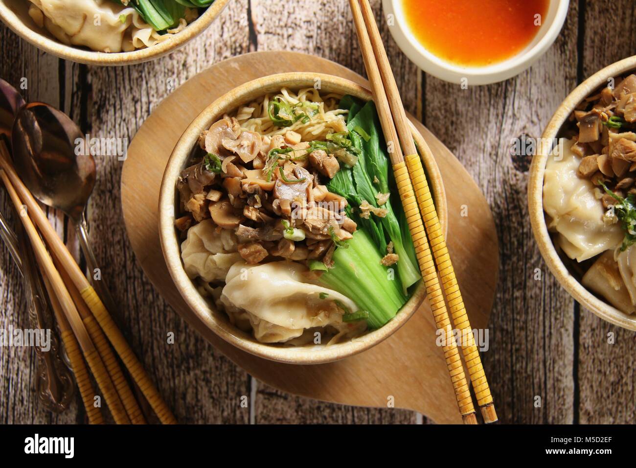 Chicken Noodle and Wonton Soup. Popular Chinese food dish of egg