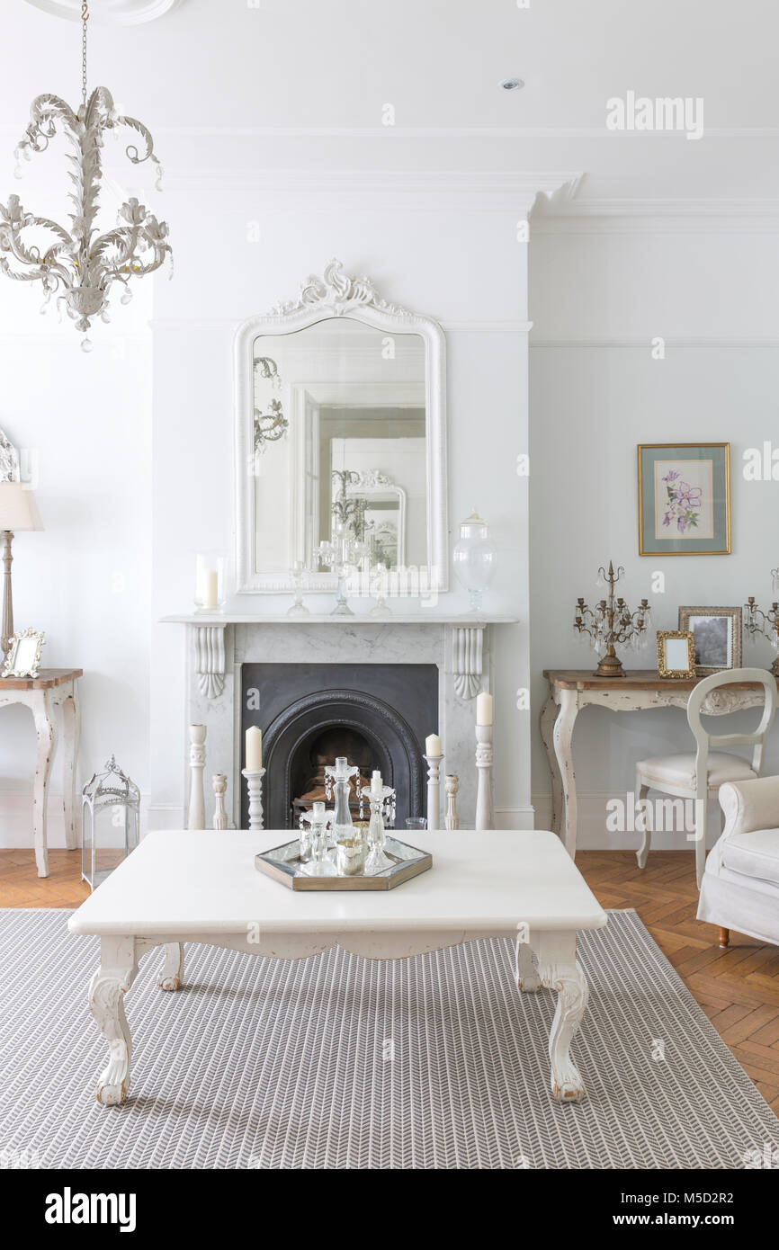 White, luxury home showcase interior living room with fireplace Stock