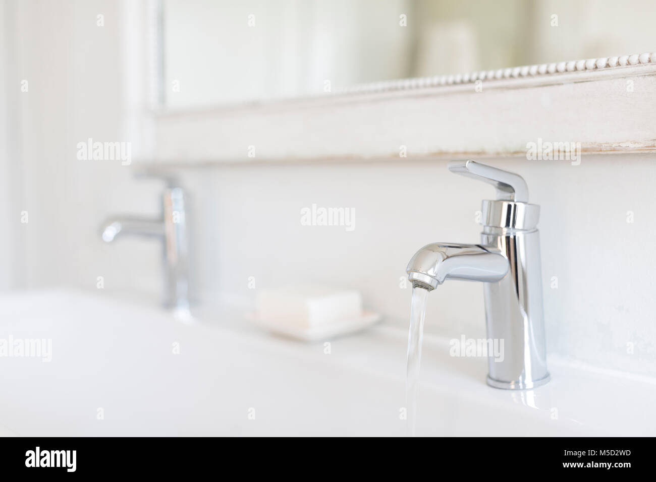 Luxury, modern stainless steel bathroom faucet Stock Photo