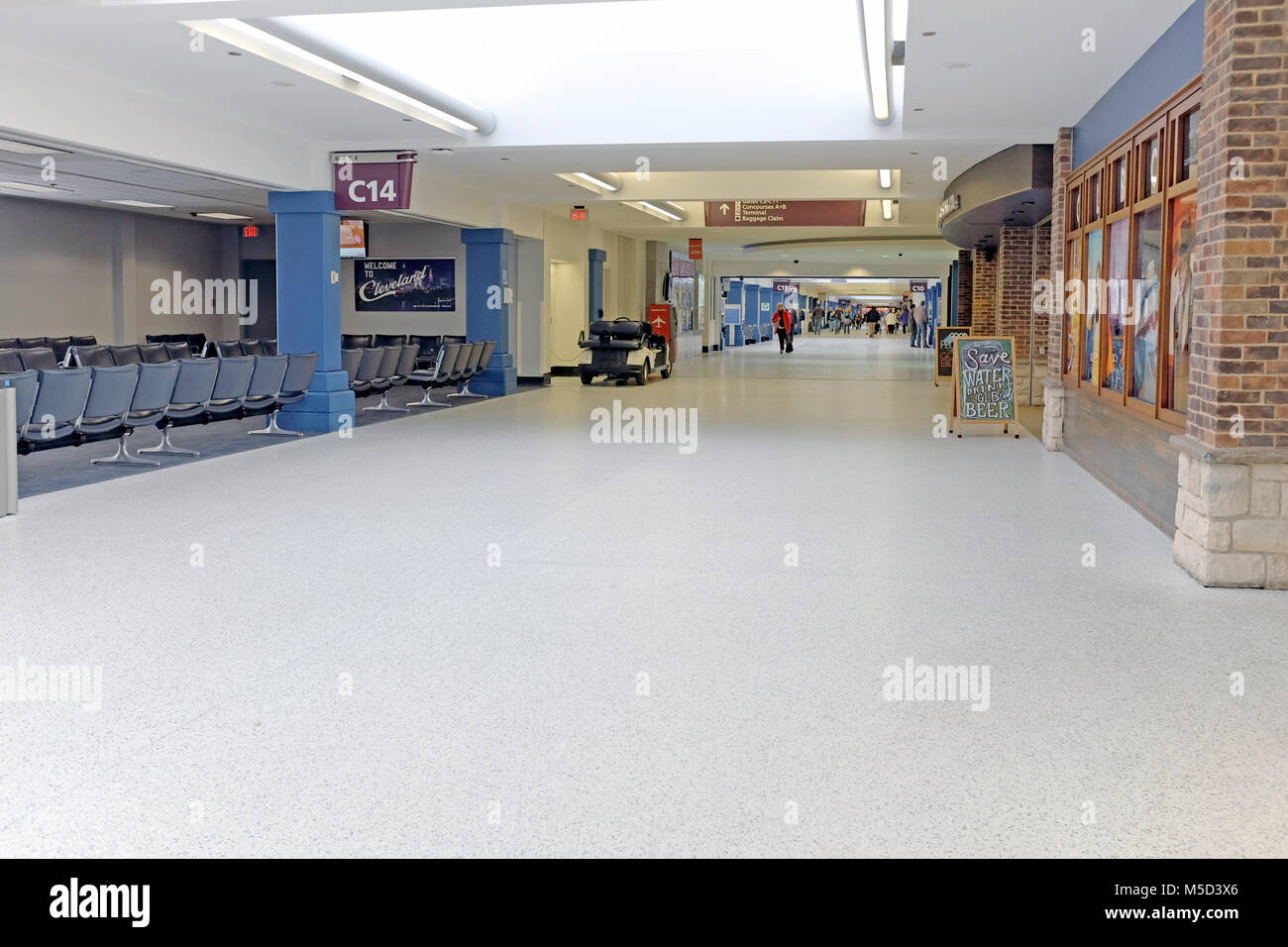 A nearly empty concourse in Cleveland Hopkins International Airport in Cleveland, Ohio, USA. Stock Photo