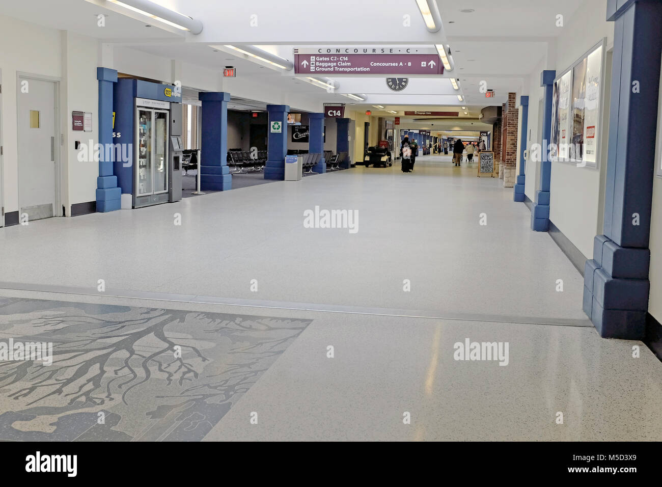 A nearly empty concourse in Cleveland Hopkins International Airport in ...