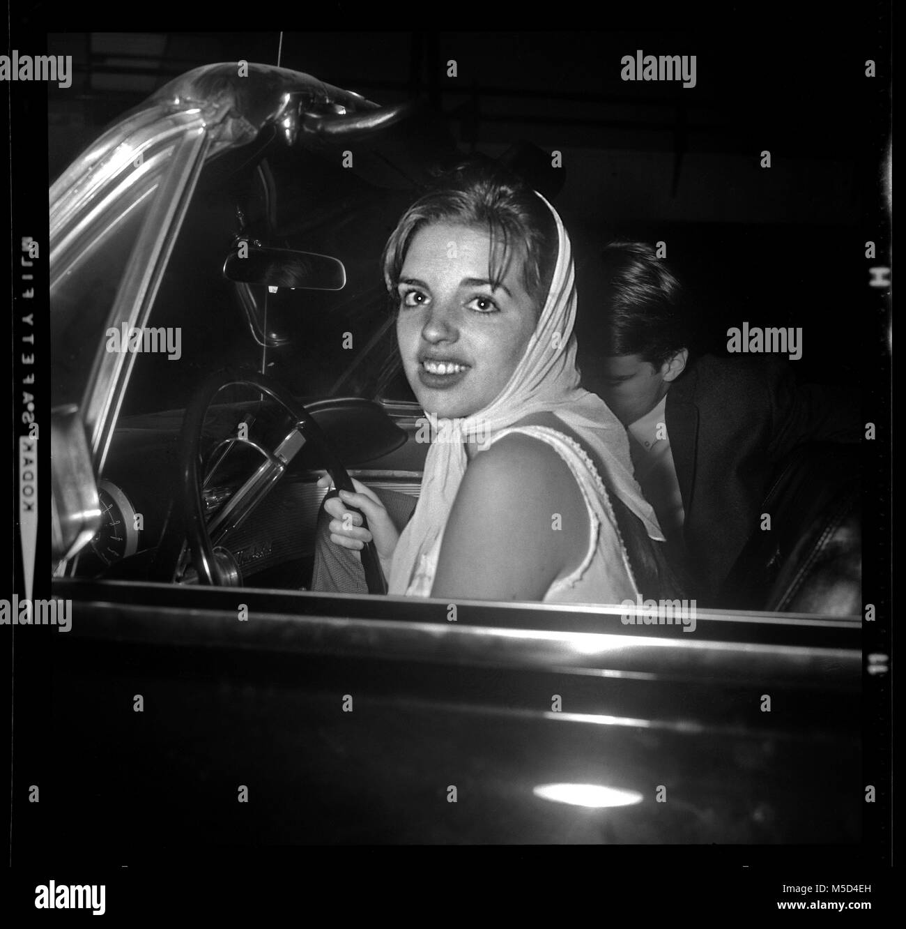 Liza Minnelli in a Thunderbird car, circa 1963. Photo from 6x6 cm original camera negative. Stock Photo