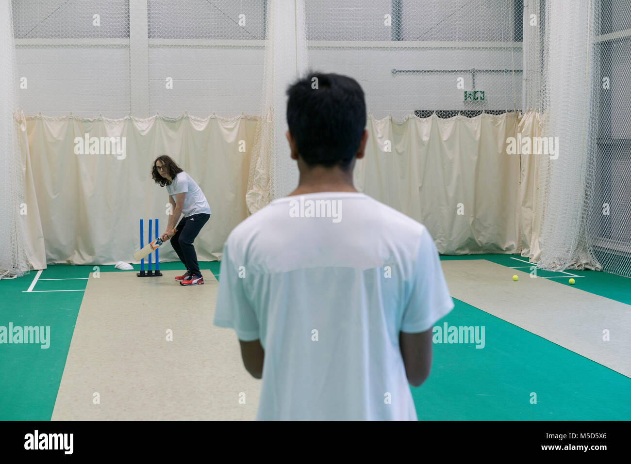 students practice cricket at state of the arts modern indoor cricket