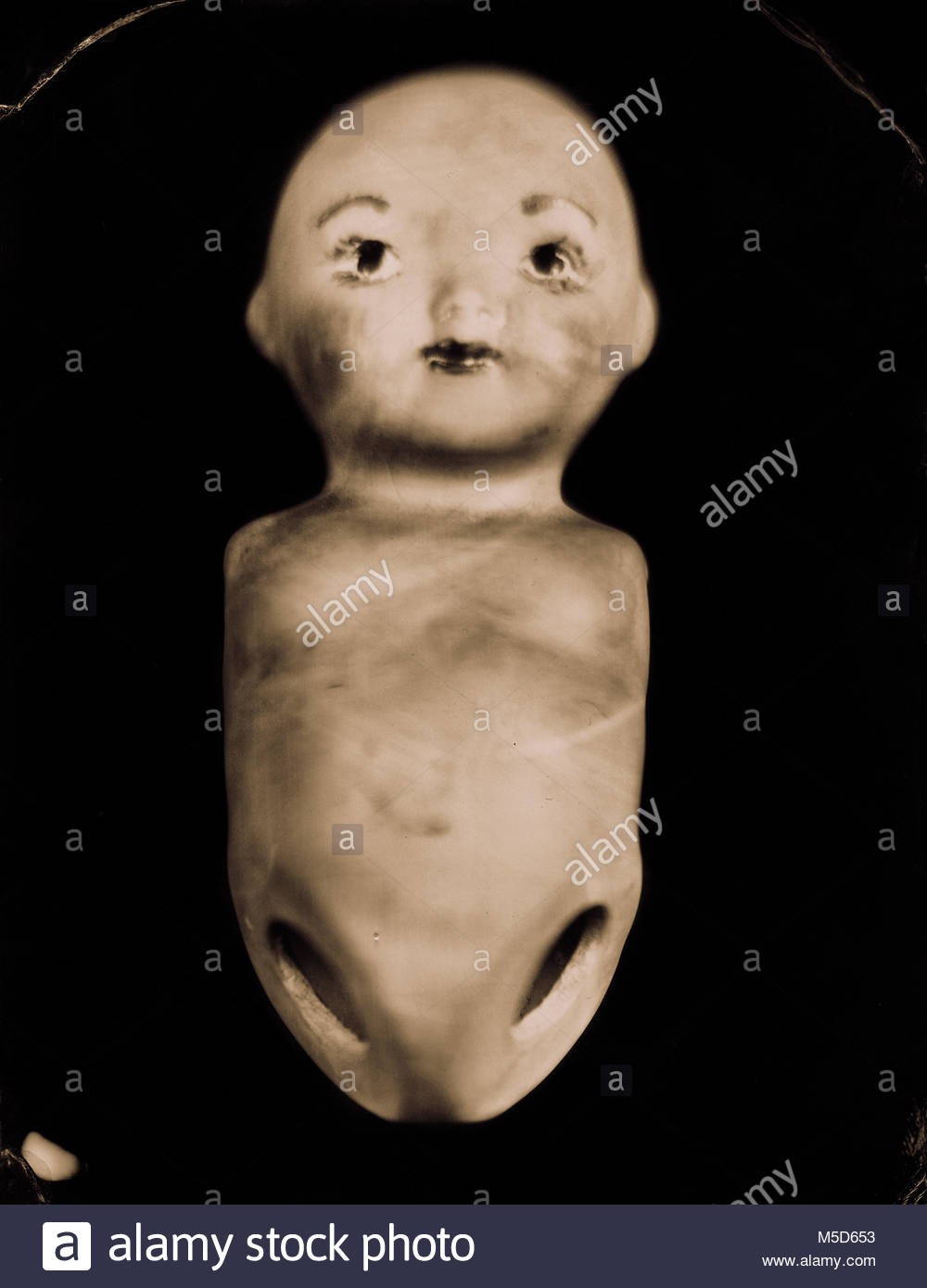 Tintype of a porcelain doll's torso Stock Photo: 175467183 - Alamy