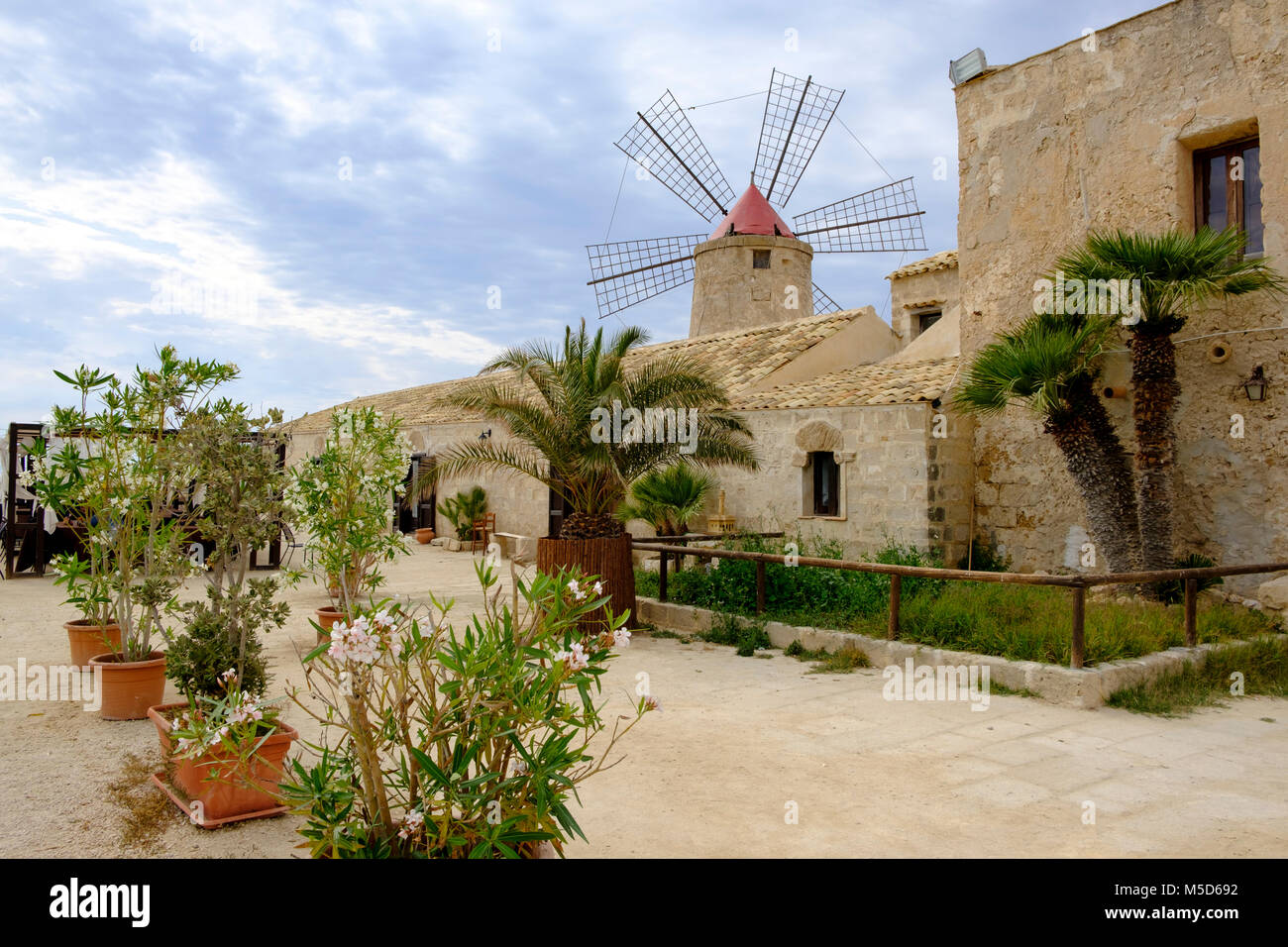 Museo del Sale, Salt Museum with Windmill, saltworks Culcasi, Via del Sale, Salt Road, Nubia, Province of Trapani, Sicily, Italy Stock Photo