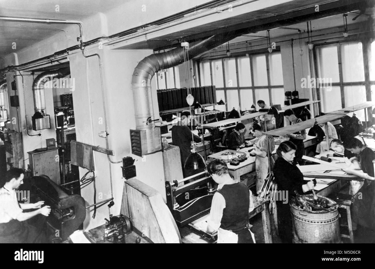 Handicraft, women working in the textile industry, 1940s, Germany Stock