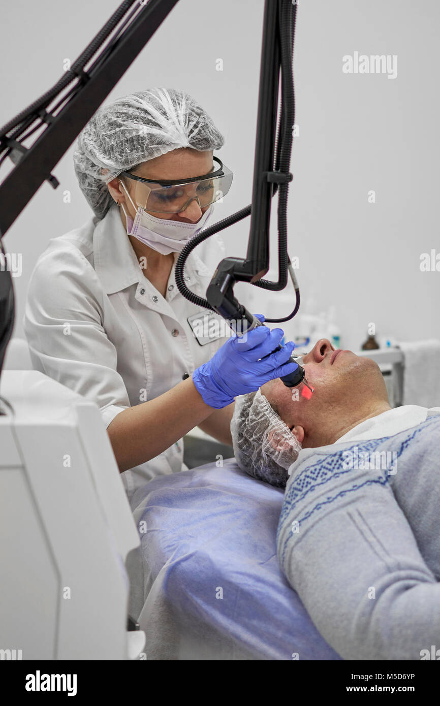 laser polishing of male face skin Stock Photo Alamy