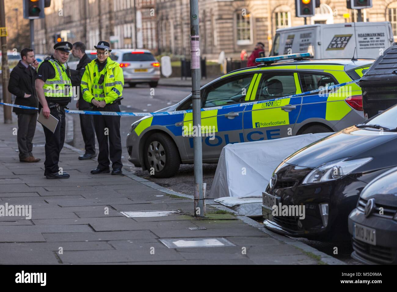 Edinburgh, UK. 22nd February, 2018. Police in Edinburgh are currently in attendance following the discovery of a man's body in East London Street.   The incident was reported to police and emergency services around 7.45am on Thursday, February 22.   Inquiries are currently ongoing, and the death is being treated as unexplained. A report will be submitted to the Procurator Fiscal. Credit: Rich Dyson/Alamy Live News Stock Photo