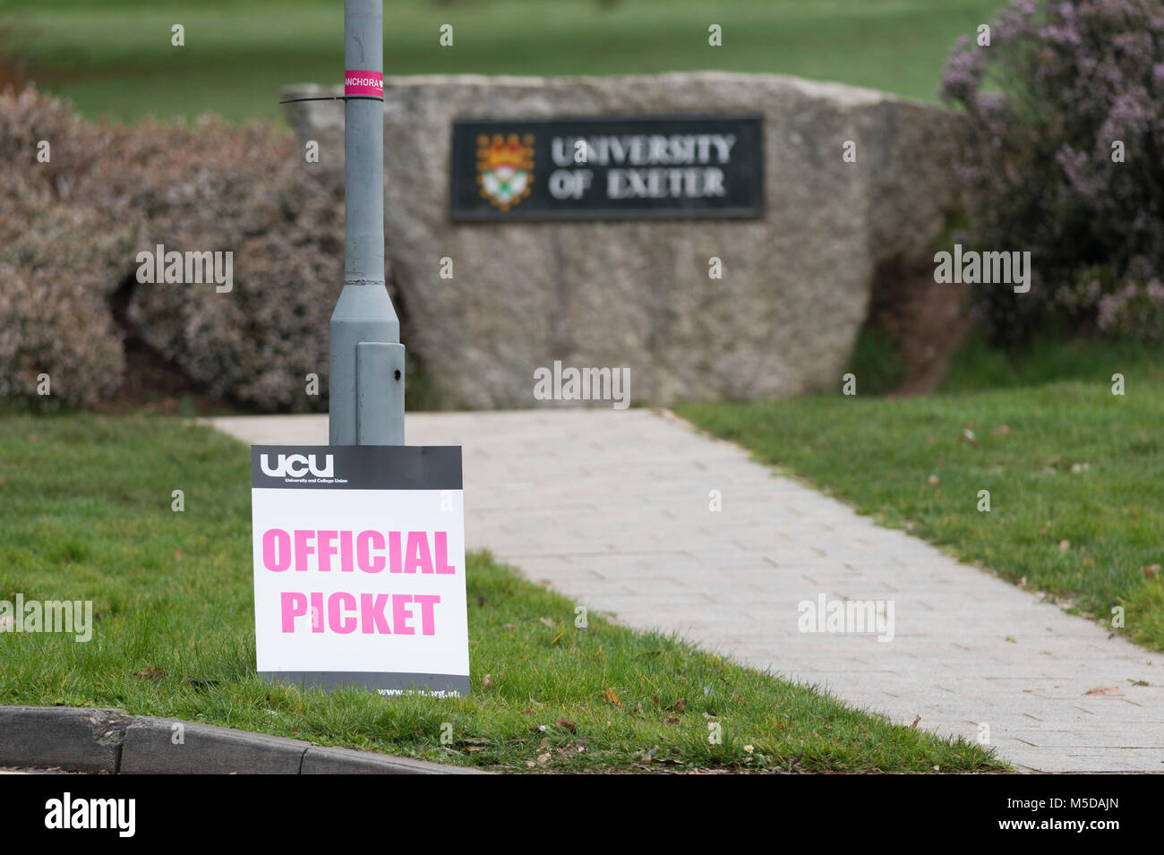 Exeter, Devon, UK. 22nd February, 2018. A placard from the University and College Union (UCU) is placed outside the University of Exeter during a strike over pension disputes. Credit: Theo Moye/Alamy Live News Stock Photo