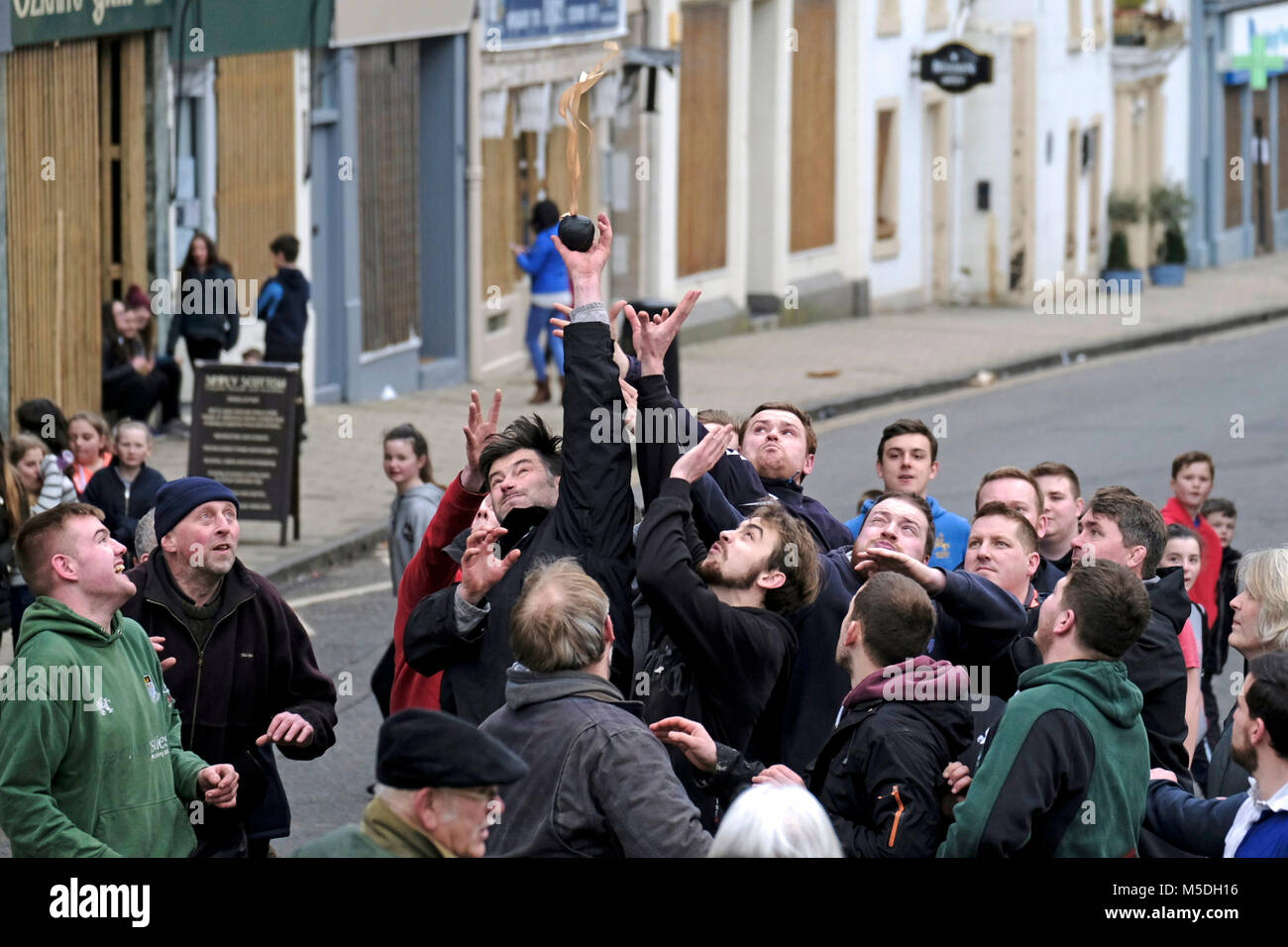 Jedburgh, Mercat Cross, UK. 22nd Feb, 2018. Jed Hand Ba' The annual game of hand ba' takes place every year the Thursday after Fastern's E'en. The tradition derives from 1548 when a party of Scots recaptured Ferniehirst Castle, a mile south of Jedburgh and used an Englishman's head in a celebratory game after the battle. ( Credit: Rob Gray/Alamy Live News Stock Photo